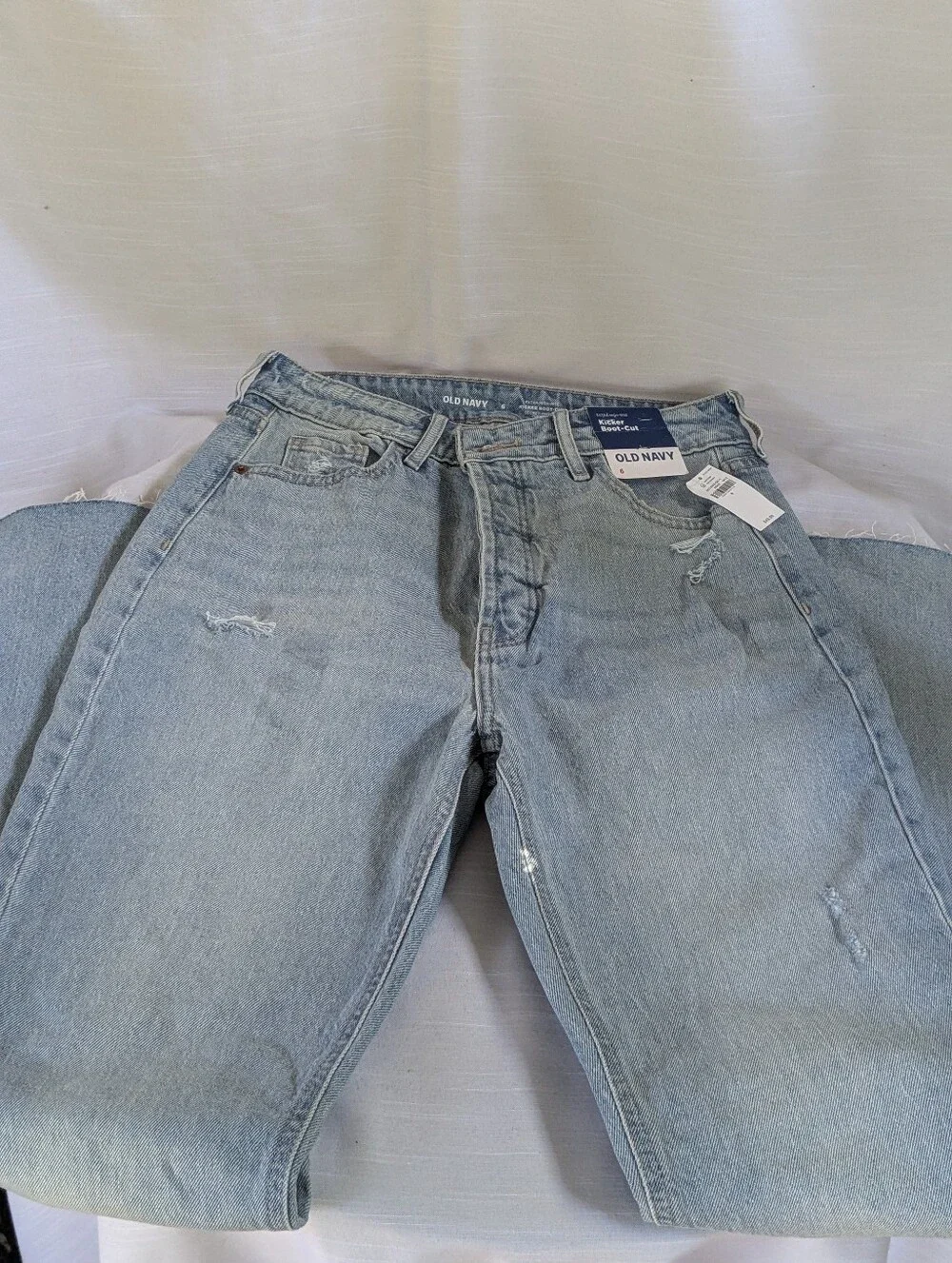 Old Navy Kicker Boot-Cut jeans featuring a light wash and distressed Sz 6